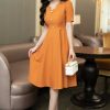 EM7095 Đầm Xoè Vàng Cổ Cách Điệu