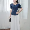 A2202 Áo Peplum Xanh Đen Phối Lá Cổ