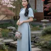 EM2208 Áo Dài Lụa Xanh Hoa Ẩn