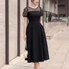 EM2238 Đầm Xòe Đen Phối Lưới Chấm Bi