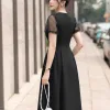 EM2238 Đầm Xòe Đen Phối Lưới Chấm Bi