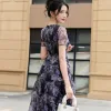 EX9764 Đầm Maxi Hoa Tím Nền Đen Xòe Tầng