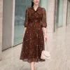 EX9775 Đầm Voan Nâu Hoa Nhí Cổ Nơ Tay Phồng