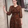 EX9775 Đầm Voan Nâu Hoa Nhí Cổ Nơ Tay Phồng