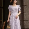 EX9784 Đầm Xoè Gấm Tím Cổ Vuông Tay Phồng