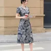 A4117 Áo Peplum Gấm Nền Xanh HT Hoa Xám
