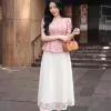 A4109 Áo Peplum Linen Xược Hồng Đất Chấm Bi