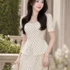 Đầm xòe công sở họa tiết bi kem EM2274